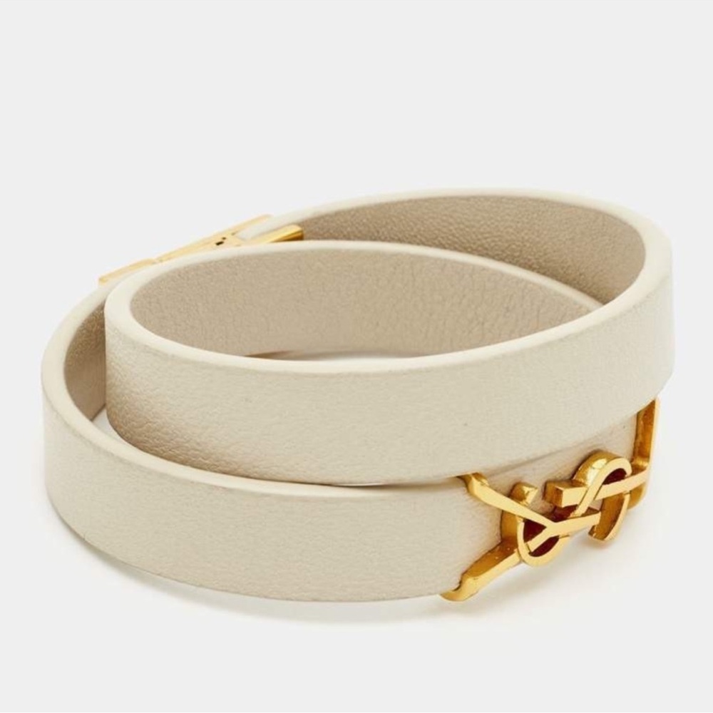 Yves Saint Laurent double cream band bracelet with gold